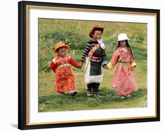 Young Tibetan Children Walk Hand in Hand Near Qinghai Lake-null-Framed Photographic Print