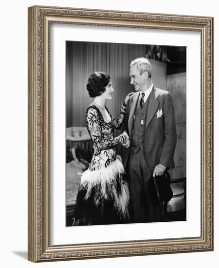 Young Woman and Mature Man Shaking Hands-null-Framed Photo