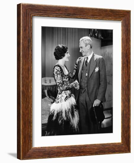 Young Woman and Mature Man Shaking Hands-null-Framed Photo