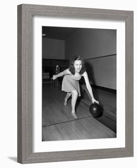 Young Woman Bowling-Philip Gendreau-Framed Photographic Print