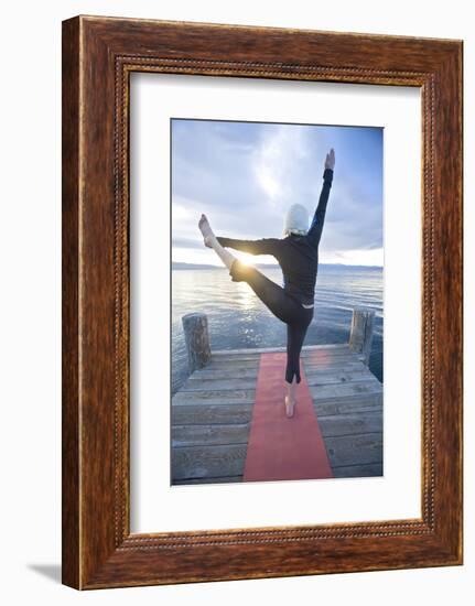 Young Woman Doing Yoga on Pier in Tahoe City, California-Justin Bailie-Framed Photographic Print