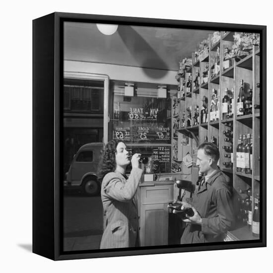 Young Woman Drinking a Bottle of Coca Cola in a Shop, Paris, France, 1950-Mark Kauffman-Framed Premier Image Canvas