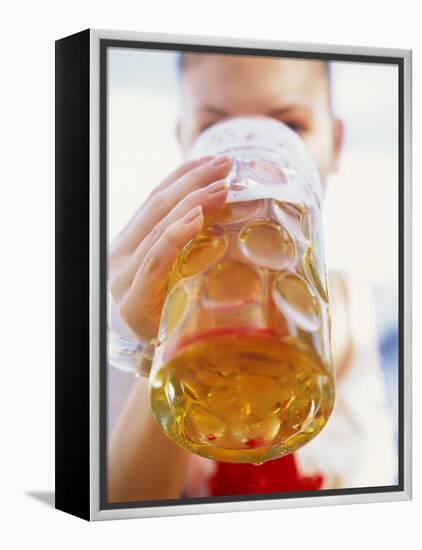 Young Woman Drinking a Litre of Beer at October Fest (Munich)-null-Framed Premier Image Canvas