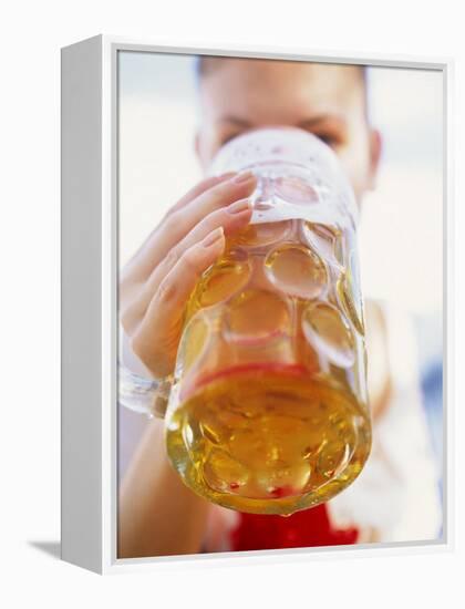 Young Woman Drinking a Litre of Beer at October Fest (Munich)-null-Framed Premier Image Canvas