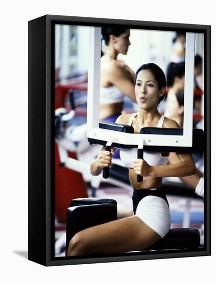 Young Woman Exercising in a Gym-null-Framed Premier Image Canvas