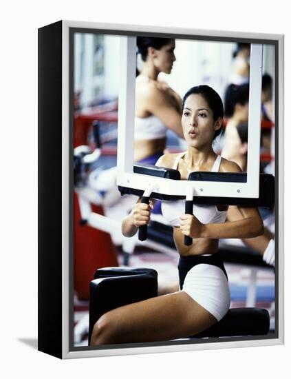 Young Woman Exercising in a Gym-null-Framed Premier Image Canvas