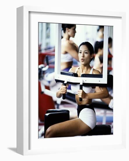 Young Woman Exercising in a Gym-null-Framed Photographic Print