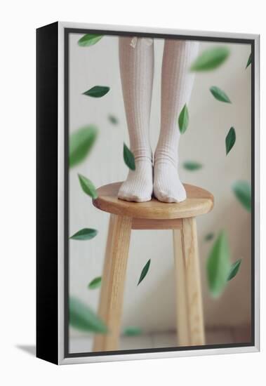 Young Woman Feet in Socks on a Stool-Carolina Hernandez-Framed Premier Image Canvas