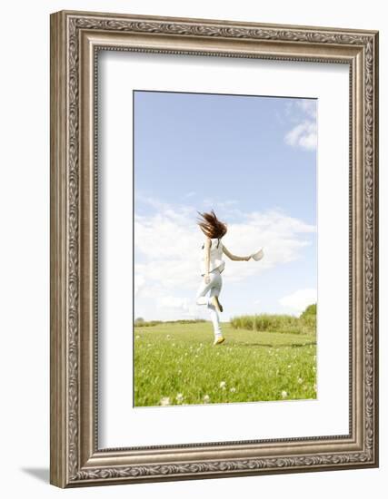 Young Woman, Fun, Meadow, Jumping-Axel Schmies-Framed Photographic Print