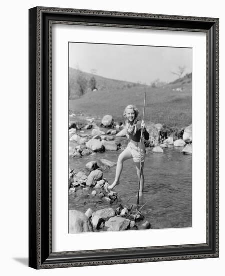 Young Woman Hiking Through a Stream of Water-null-Framed Photo