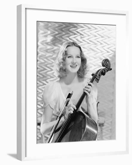 Young Woman Holding a Bow and Cello-null-Framed Photo