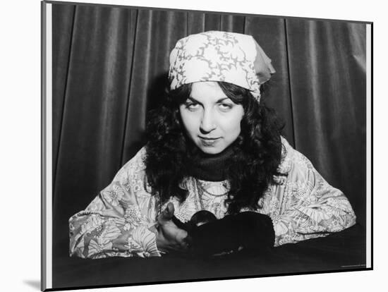 Young Woman Holding a Crystal Ball-null-Mounted Photographic Print