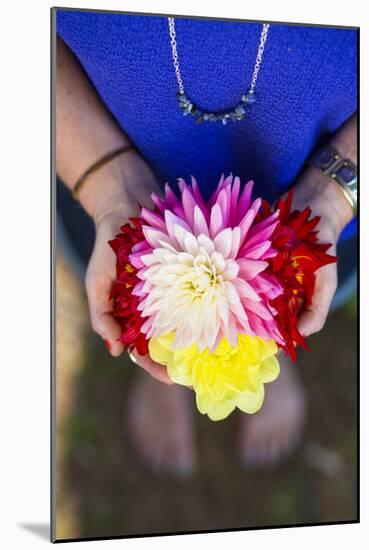 Young Woman Holding Flowers-Justin Bailie-Mounted Photographic Print