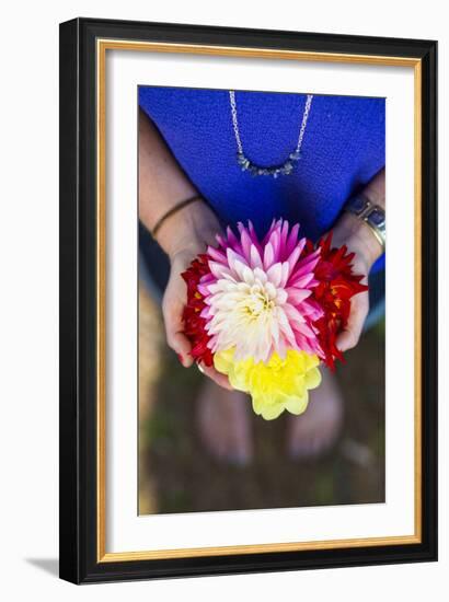 Young Woman Holding Flowers-Justin Bailie-Framed Photographic Print