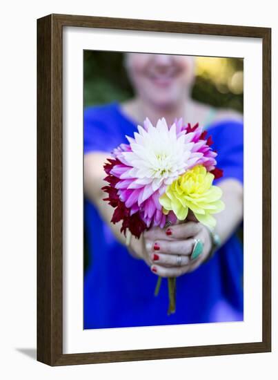 Young Woman Holding Flowers-Justin Bailie-Framed Photographic Print