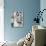 Young Woman in an Apron in Her Kitchen Taking Food Out of the Refrigerator-null-Photo displayed on a wall