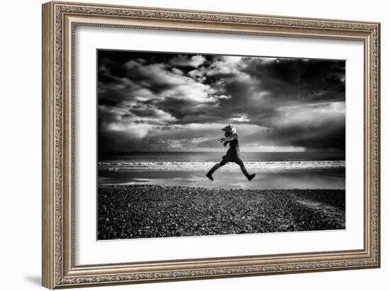 Young Woman Jumping on Beach-Rory Garforth-Framed Photographic Print