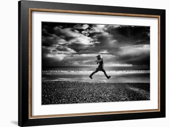 Young Woman Jumping on Beach-Rory Garforth-Framed Photographic Print