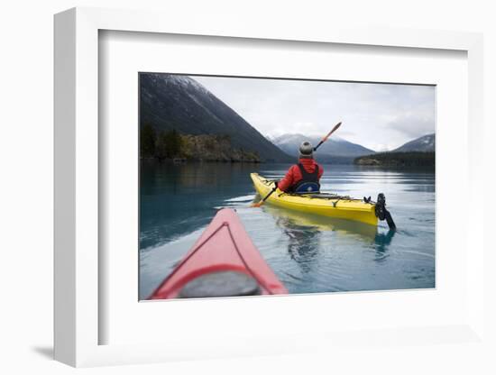 Young Woman Kayaking on Chilko Lake in British Columbia, Canada-Justin Bailie-Framed Photographic Print