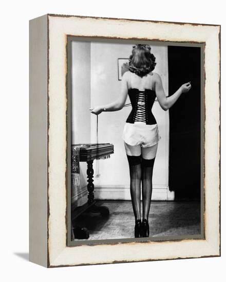 Young Woman Lacing Her Corset-Bettmann-Framed Premier Image Canvas