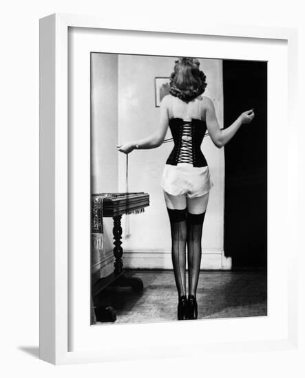 Young Woman Lacing Her Corset-Bettmann-Framed Photographic Print