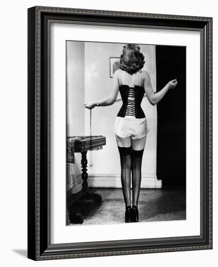 Young Woman Lacing Her Corset-Bettmann-Framed Photographic Print