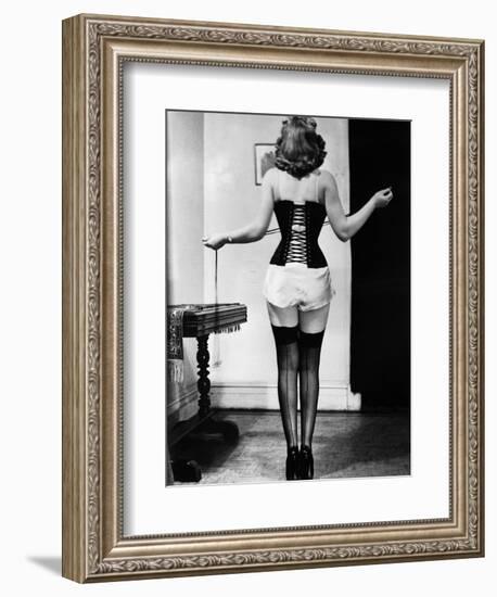 Young Woman Lacing Her Corset-Bettmann-Framed Photographic Print