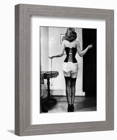 Young Woman Lacing Her Corset-Bettmann-Framed Photographic Print