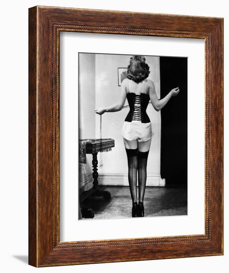 Young Woman Lacing Her Corset-Bettmann-Framed Photographic Print