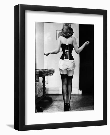 Young Woman Lacing Her Corset-Bettmann-Framed Photographic Print