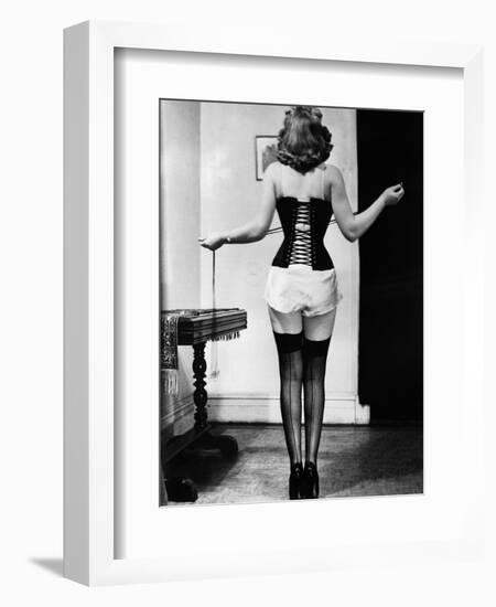 Young Woman Lacing Her Corset-Bettmann-Framed Photographic Print