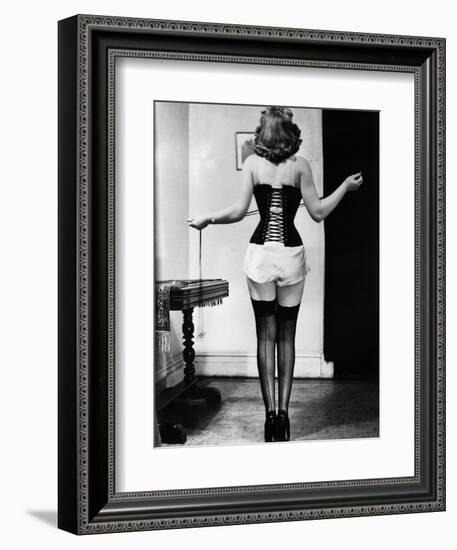 Young Woman Lacing Her Corset-Bettmann-Framed Photographic Print