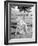 Young Woman on a Golf Course Placing a Golf Ball-null-Framed Photo