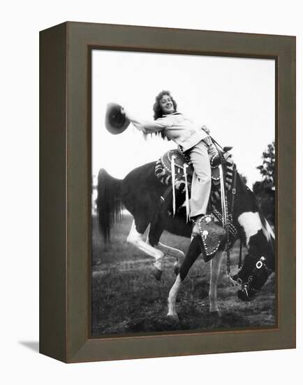 Young Woman on Phony Pony, Ca. 1940-null-Framed Premier Image Canvas