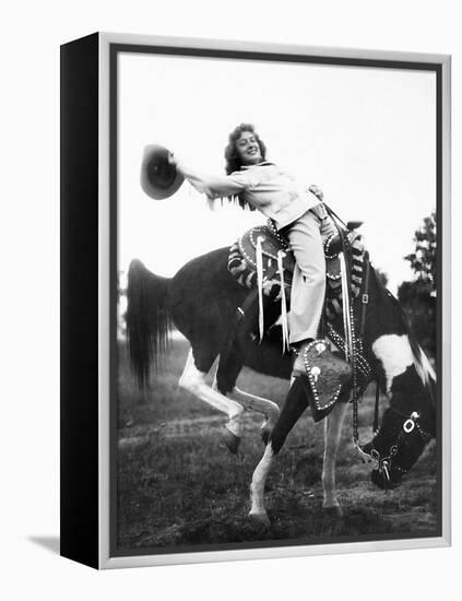 Young Woman on Phony Pony, Ca. 1940-null-Framed Premier Image Canvas