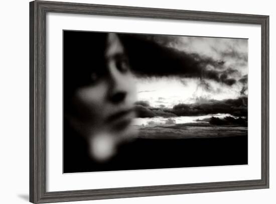 Young Woman Out of Focus in Front of Cloudy Sky Looking into the Camera-Torsten Richter-Framed Photographic Print