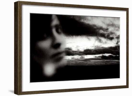 Young Woman Out of Focus in Front of Cloudy Sky Looking into the Camera-Torsten Richter-Framed Photographic Print