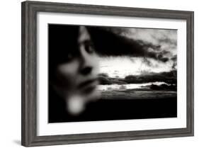 Young Woman Out of Focus in Front of Cloudy Sky Looking into the Camera-Torsten Richter-Framed Photographic Print