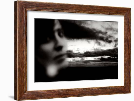 Young Woman Out of Focus in Front of Cloudy Sky Looking into the Camera-Torsten Richter-Framed Photographic Print