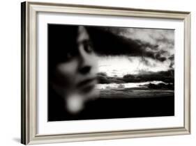 Young Woman Out of Focus in Front of Cloudy Sky Looking into the Camera-Torsten Richter-Framed Photographic Print