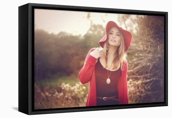 Young Woman Outdoors Wearing a Red Hat-Sabine Rosch-Framed Premier Image Canvas