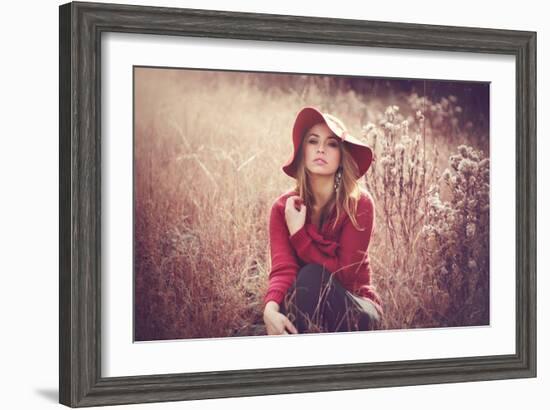 Young Woman Outdoors Wearing a Red Hat-Sabine Rosch-Framed Photographic Print