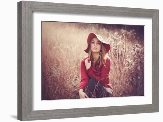 Young Woman Outdoors Wearing a Red Hat-Sabine Rosch-Framed Photographic Print