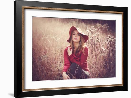 Young Woman Outdoors Wearing a Red Hat-Sabine Rosch-Framed Photographic Print