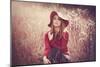 Young Woman Outdoors Wearing a Red Hat-Sabine Rosch-Mounted Photographic Print