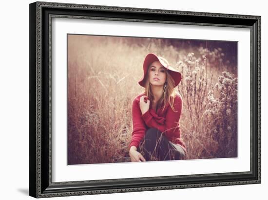 Young Woman Outdoors Wearing a Red Hat-Sabine Rosch-Framed Photographic Print