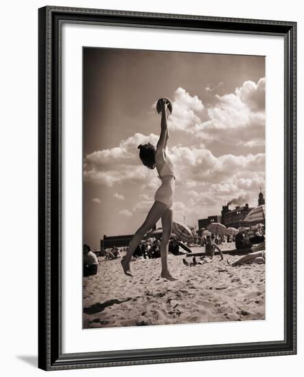 Young Woman Playing Ball on Beach-Philip Gendreau-Framed Photographic Print