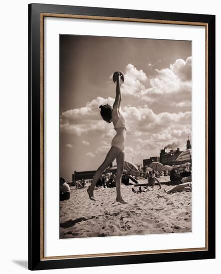 Young Woman Playing Ball on Beach-Philip Gendreau-Framed Photographic Print