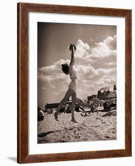 Young Woman Playing Ball on Beach-Philip Gendreau-Framed Photographic Print