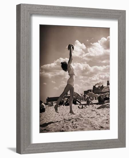 Young Woman Playing Ball on Beach-Philip Gendreau-Framed Photographic Print